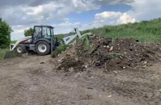 В Курске подрядчик убирает незаконную свалку напротив ТЭЦ-1